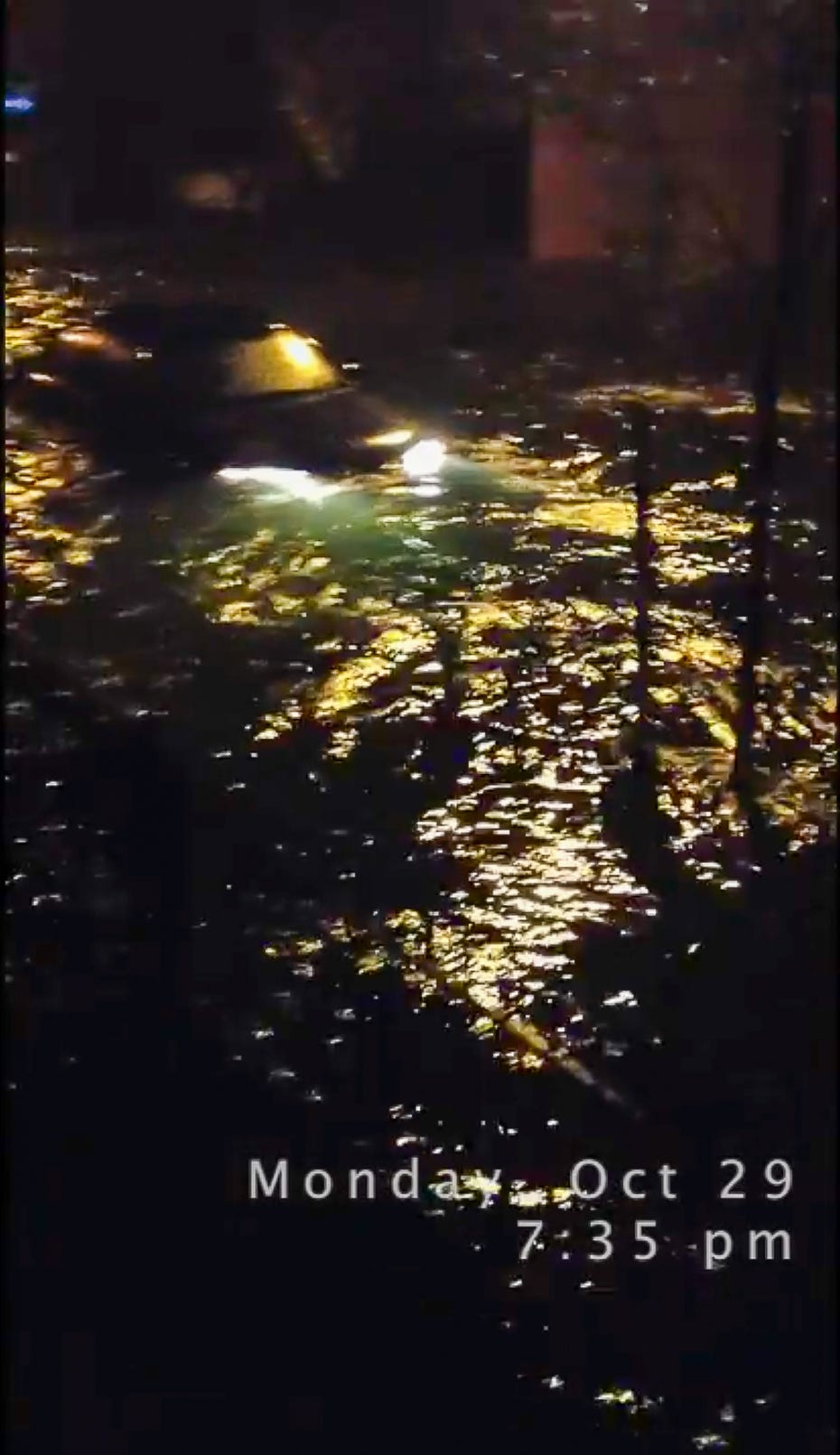 Flloded street, lights out.